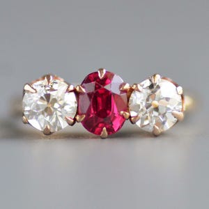 Antique early 1900s ruby and old mine cut diamond three stone ring in 18k & 14k gold