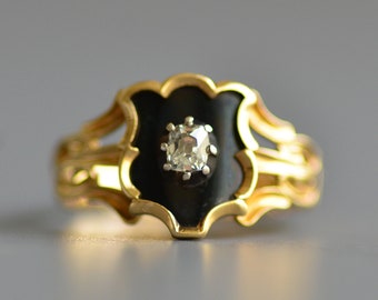 Antique Georgian Era cushion old mine cut diamond and black enamel mourning ring in 18k gold shield shape
