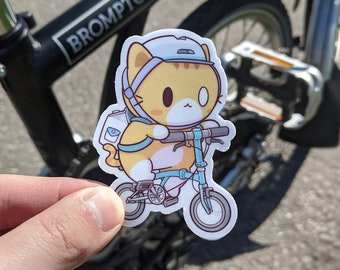 Cat on a Bike Vinyl Sticker (3")