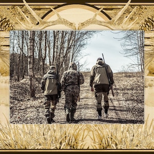 May include: Three people wearing camouflage clothing walk through a wooded area, carrying rifles. The people are walking on a dirt path, and the trees are bare.
