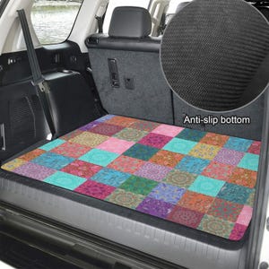 May include: A rectangular cargo area mat featuring a colorful patchwork design of various mandala patterns in shades of teal, pink, orange, and purple. The mat has a textured black anti-slip bottom surface as shown in the circular inset.