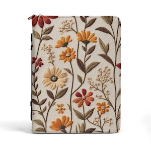 May include: A cream-coloured case with an embroidered floral pattern. The design features orange, red, and yellow flowers with brown stems and leaves. The case has a zip closure and is likely designed for a tablet or e-reader. The measurements are in centimeters.