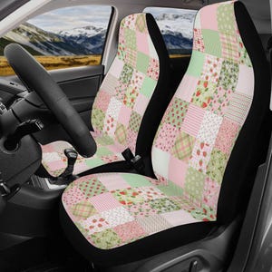 May include: Car seat covers featuring a patchwork design in pink, green, and white. The pattern includes squares with strawberries, gingham, and plaid. The seat covers have black borders and are installed in a car.