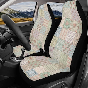 May include: A pair of car seat covers featuring a patchwork design with various floral, checkered, and striped patterns in soft pastel shades of pink, blue, green, and cream. The covers have solid black side panels and fit over the front vehicle seats.