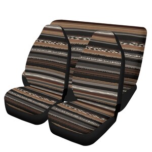 May include: Set of car seat covers with a Southwestern-inspired design. The covers feature a pattern of horizontal stripes in shades of brown, black, gray, and white. The seat covers have a black base.