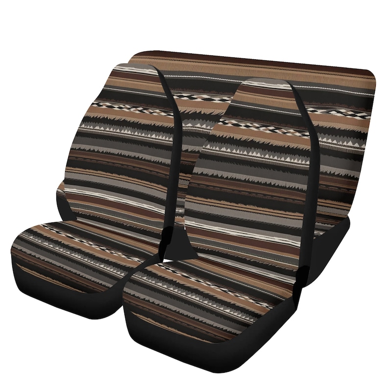 May include: Set of car seat covers with a Southwestern-inspired design. The covers feature a pattern of horizontal stripes in shades of brown, black, gray, and white. The seat covers have a black base.