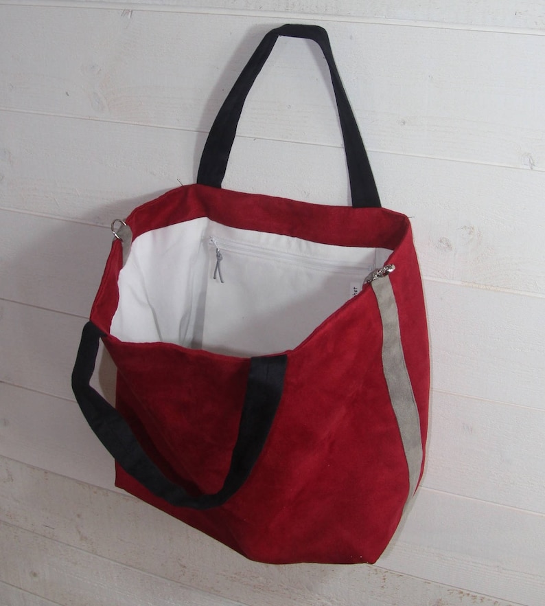 Large women/'s tote bag in red suedette with 2 black handles and a grey edging