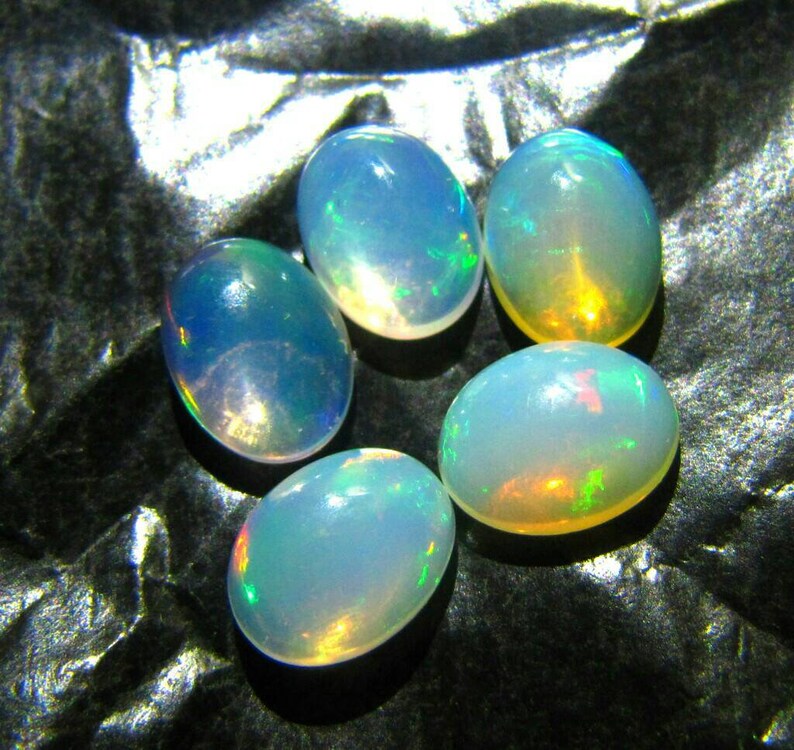 7\u00d75 oval natural Ethiopian opal gemstone cabochon calibrated 5 piece 2.50 crt welo opal multi fleshy fire opal 7\u00d75 opal cabochon opal loose