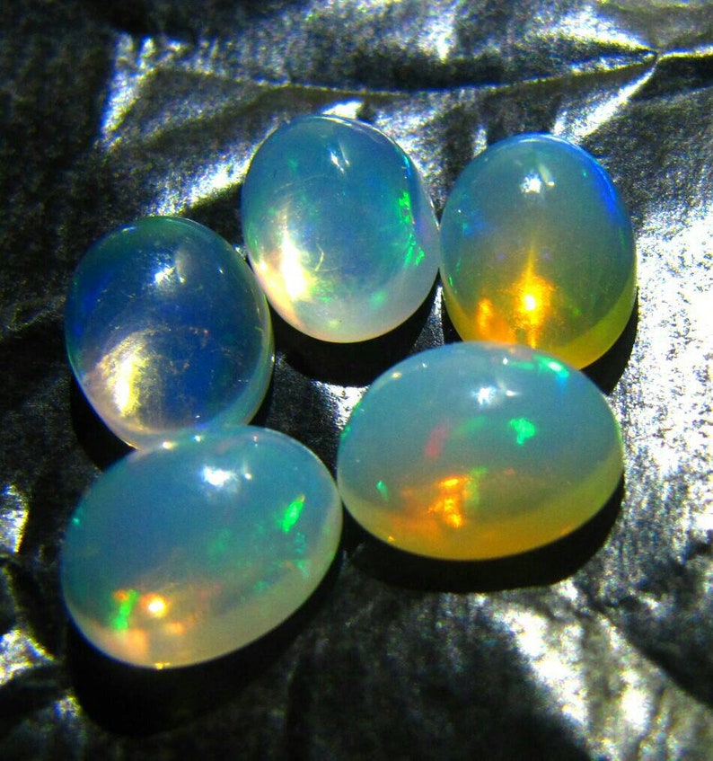 7\u00d75 oval natural Ethiopian opal gemstone cabochon calibrated 5 piece 2.50 crt welo opal multi fleshy fire opal 7\u00d75 opal cabochon opal loose