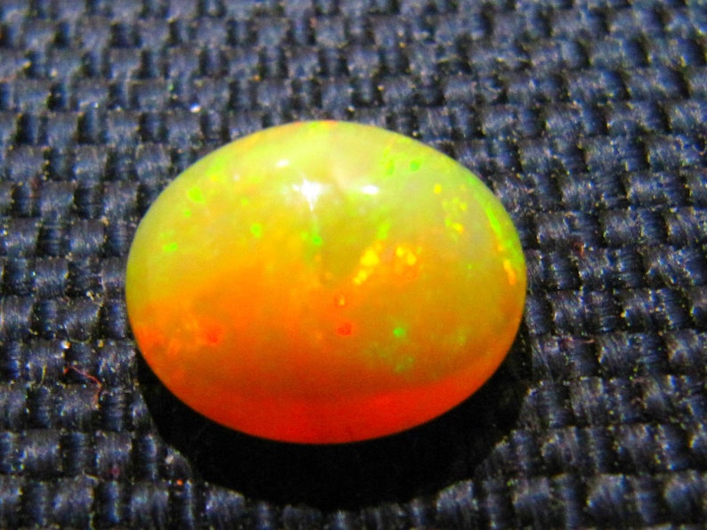 10\u00d711 mm oval natural Ethiopian opal gemstones cabochon calibrated loose opal stone 1 piece multi flashy fire opal opal cabochon opal