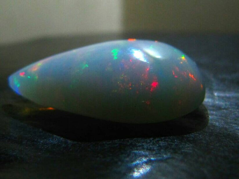 21\u00d717\u00d77 natural Ethiopian opal gemstone 1 piece 11.40 crt pear shape cabochon loose stone welo opal multi fleshy fite opal free size opal