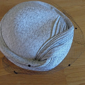 French black and white hat with mesh veil by Rosemay Paris