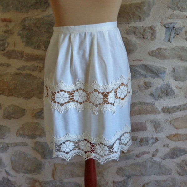 Cream half apron with deep bands of lace