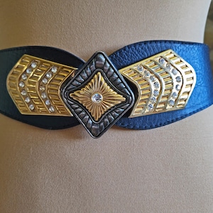 Black leather statement belt with metal details, back fastening waist belt