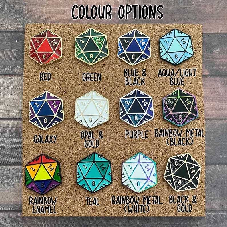 May include: A chart with 12 different color options for a 20-sided die pin. The colors include red, green, blue and black, aqua/light blue, galaxy, opal and gold, purple, rainbow metal (black), rainbow enamel, teal, rainbow metal (white), and black and gold.