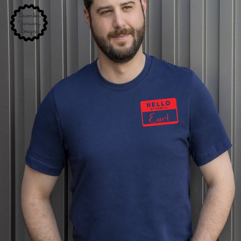 May include: A navy blue t-shirt with a red name tag that says "Hello, My Name Is Earl".