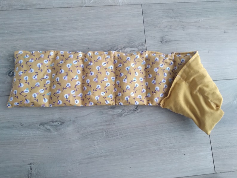 organic dry hot water bottle with cherry stones fleur boule jaune