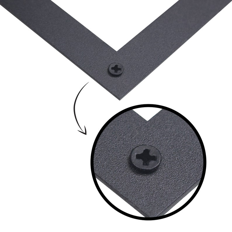 May include: Close-up of a black metal corner brace with a screw in the center. The screw is visible and has a Phillips head.
