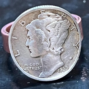 May include: Silver 1939 Walking Liberty Half Dollar coin with the words "In God We Trust" and "Liberty" visible. The coin is in a ring setting.