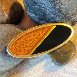 Vintage Yves Saint Laurent (YSL) Brooch 1970s-80s Oval Gold-Tone Lucite Orange/Black Signed COA