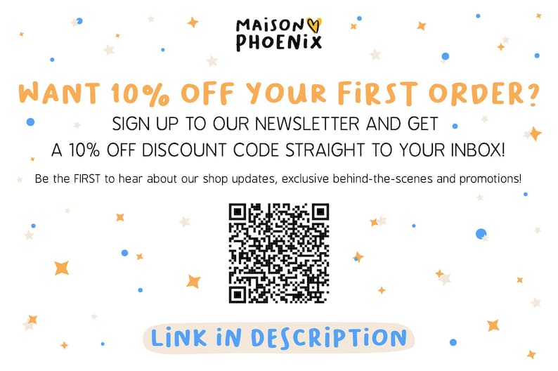 May include: A white and orange graphic with the text "MAISON PHOENIX" and a heart symbol. The text "WANT 10% OFF YOUR FIRST ORDER?" is in large orange letters. The text "SIGN UP TO OUR NEWSLETTER AND GET A 10% OFF DISCOUNT CODE STRAIGHT TO YOUR INBOX!" is in smaller orange letters. The text "Be the FIRST to hear about our shop updates, exclusive behind-the-scenes and promotions!" is in even smaller orange letters. A QR code is in the center of the graphic. The text "LINK IN DESCRIPTION" is in orange letters with a white background.