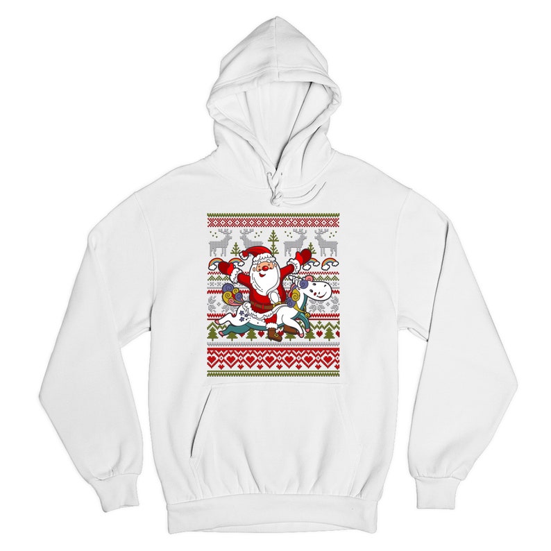 May include: White hooded sweatshirt with a Christmas-themed design featuring Santa Claus riding a unicorn. The design includes a red and green snowflake pattern and the text "Merry Christmas".