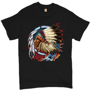 May include: Black t-shirt with a colorful illustration of a Native American chief wearing a headdress with feathers. The chief is surrounded by feathers and animal paw prints.