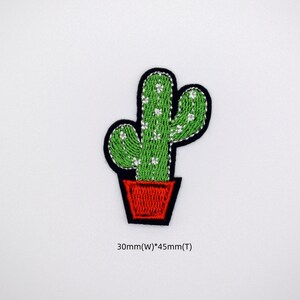 May include: Green cactus with white dots in a red pot, embroidered iron-on patch, 30mm wide by 45mm tall.