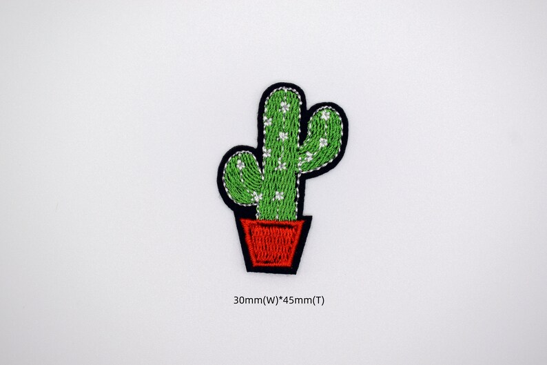 May include: Green cactus with white dots in a red pot, embroidered iron-on patch, 30mm wide by 45mm tall.