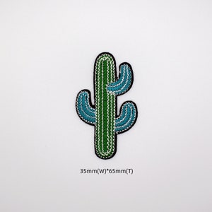 May include: Green and blue embroidered cactus patch, 35mm wide by 65mm tall.