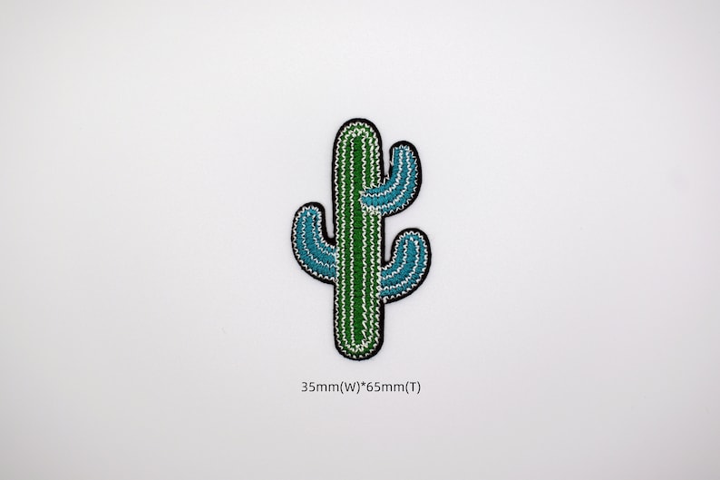 May include: Green and blue embroidered cactus patch, 35mm wide by 65mm tall.