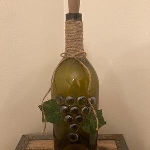 decorative light up wine bottle with glass grapes