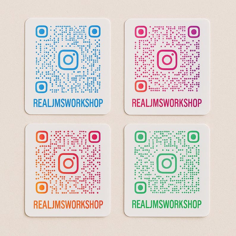 May include: Four square white stickers featuring Instagram QR codes in blue, pink, orange-to-pink gradient, and green. Each sticker displays the Instagram logo in the center and the text REALJMSWORKSHOP printed in capital letters at the bottom.
