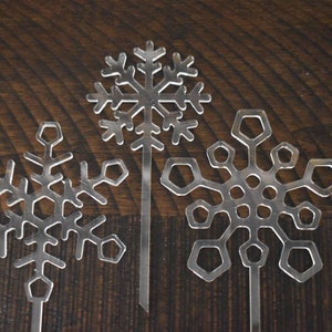 Three clear Acrylic laser cut snowflake cake toppers winter party supply decoration image 5