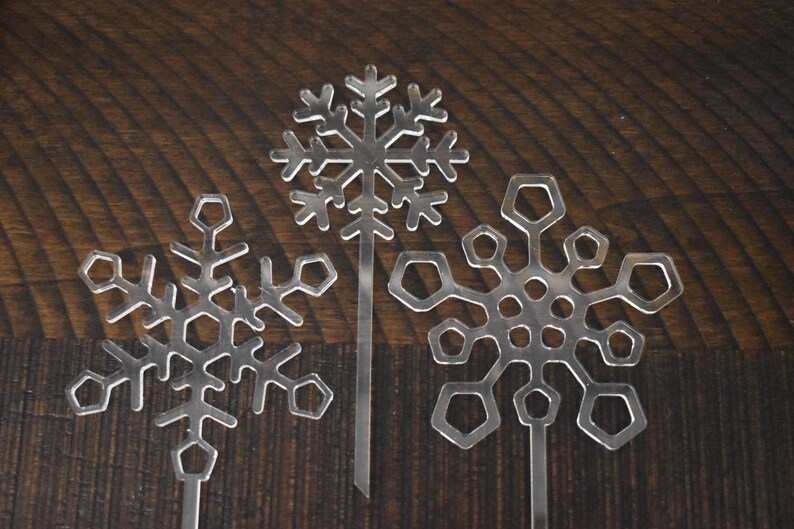 Three clear Acrylic laser cut snowflake cake toppers winter party supply decoration image 5