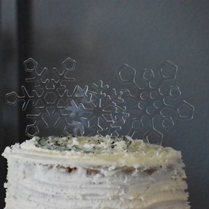 Three clear Acrylic laser cut snowflake cake toppers winter party supply decoration image 4