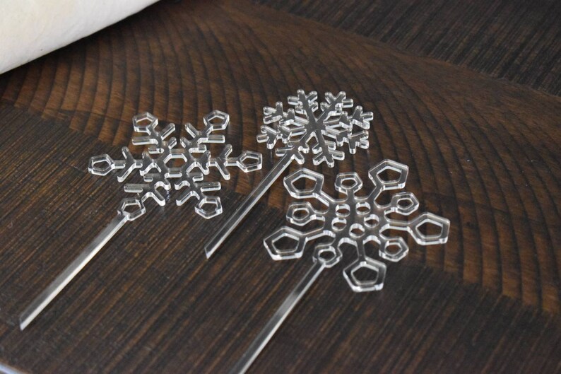 Three clear Acrylic laser cut snowflake cake toppers winter party supply decoration image 7