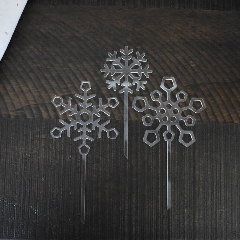 Three clear Acrylic laser cut snowflake cake toppers winter party supply decoration image 2