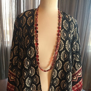 Custom Couture S black fan kimono with long geoemetric red necklace 1640