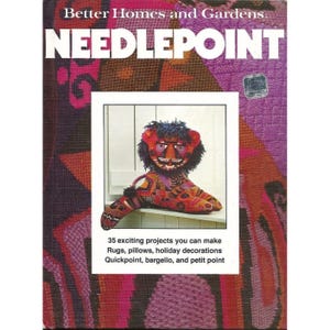 May include: A vintage book cover for "Needlepoint" by Better Homes and Gardens. The cover features a colorful, handmade lion-like figure. Text includes "35 exciting projects you can make" for rugs, pillows, and holiday decorations.