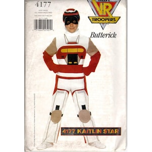 May include: A Butterick sewing pattern envelope for a VR Troopers Kaitlin Star costume, model 4177. The image displays a white, red, and tan jumpsuit with a matching helmet, featuring a chest plate design and knee pads, with the logo at the top.