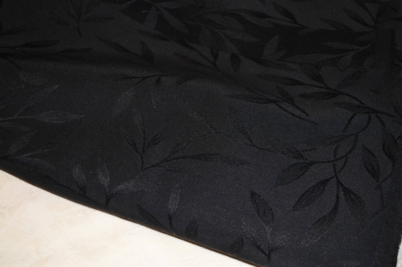 Solid black polyester upholstery fabric coupon with foliage image 2