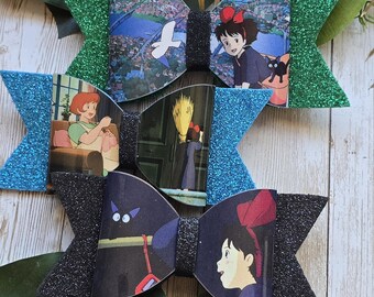 Laço do livro de histórias do Serviço de Entregas da Kiki - M