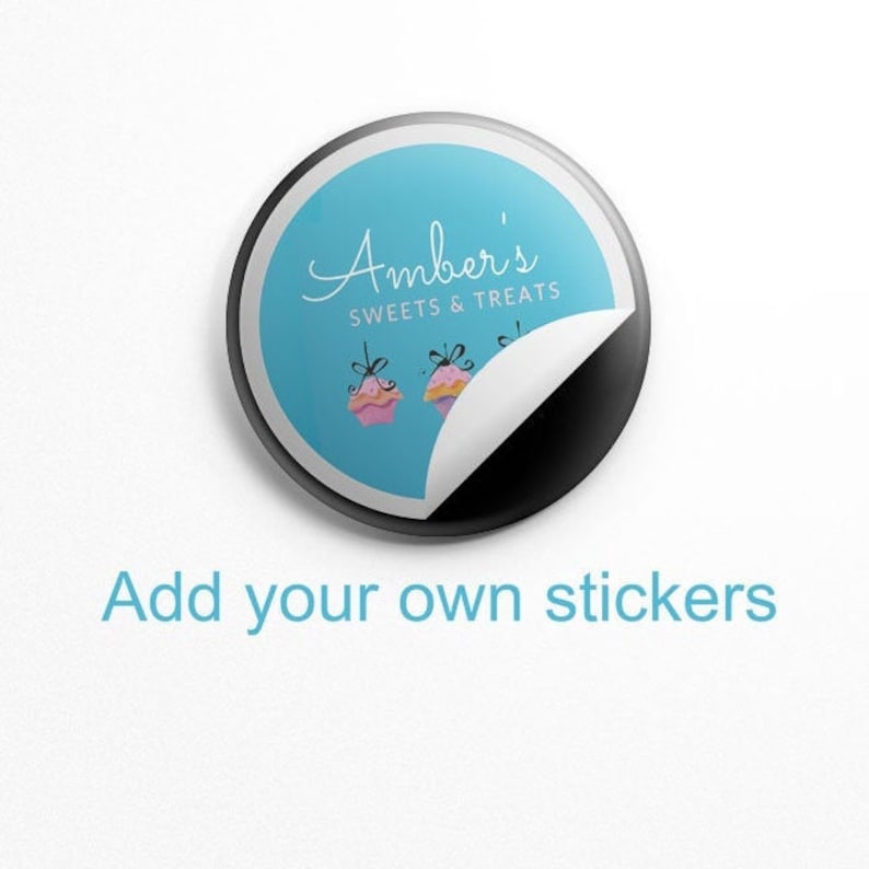 May include: A blue and black round sticker with the text "Amber's Sweets & Treats" and two cartoon cupcakes. The sticker is partially peeled back to reveal the black backing.