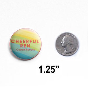 May include: A 1.25 inch round button with a rainbow gradient background. The button has the text "CHEERFUL REN" in red letters and "Custom Buttons" in smaller black letters.