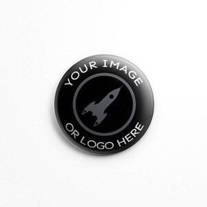 May include: Black button with white text that reads "YOUR IMAGE OR LOGO HERE" and a gray rocket ship icon in the center.