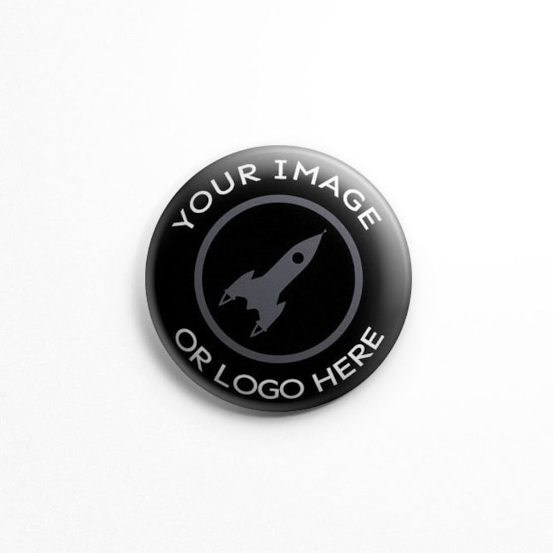 May include: Black button with white text that reads "YOUR IMAGE OR LOGO HERE" and a gray rocket ship icon in the center.