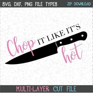 May include: A black kitchen knife with a pink inscription that reads "Chop it like it's hot".