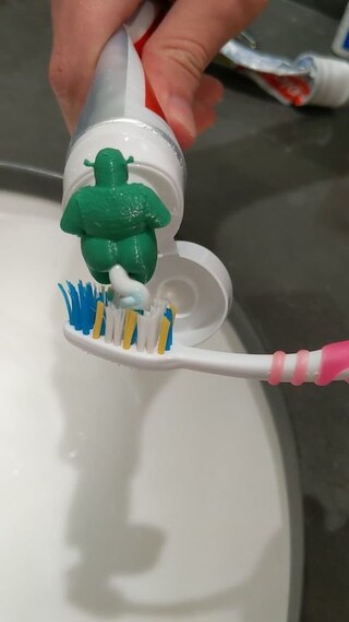 Shrek pooping toothpaste topper