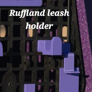 Soporte para correa para perreras Ruffland. Resistente y fácil de instalar y quitar.